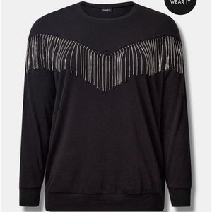Cozy fleece crew neck with shoulder rhinestone fringe .